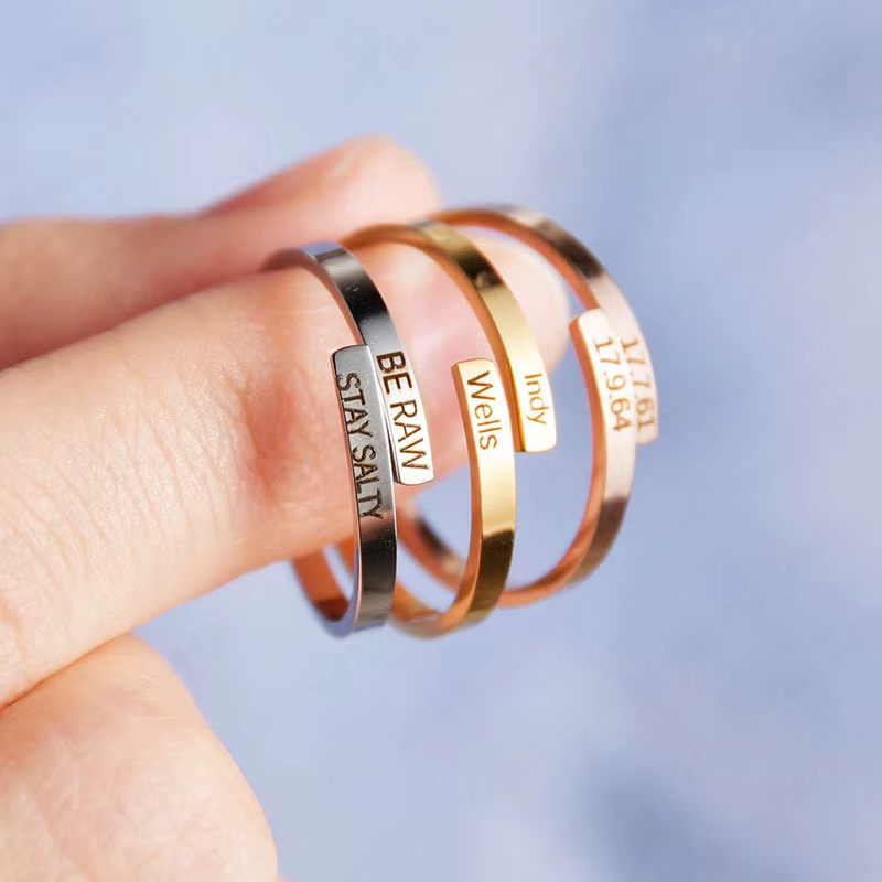 Adjustable engraved message ring